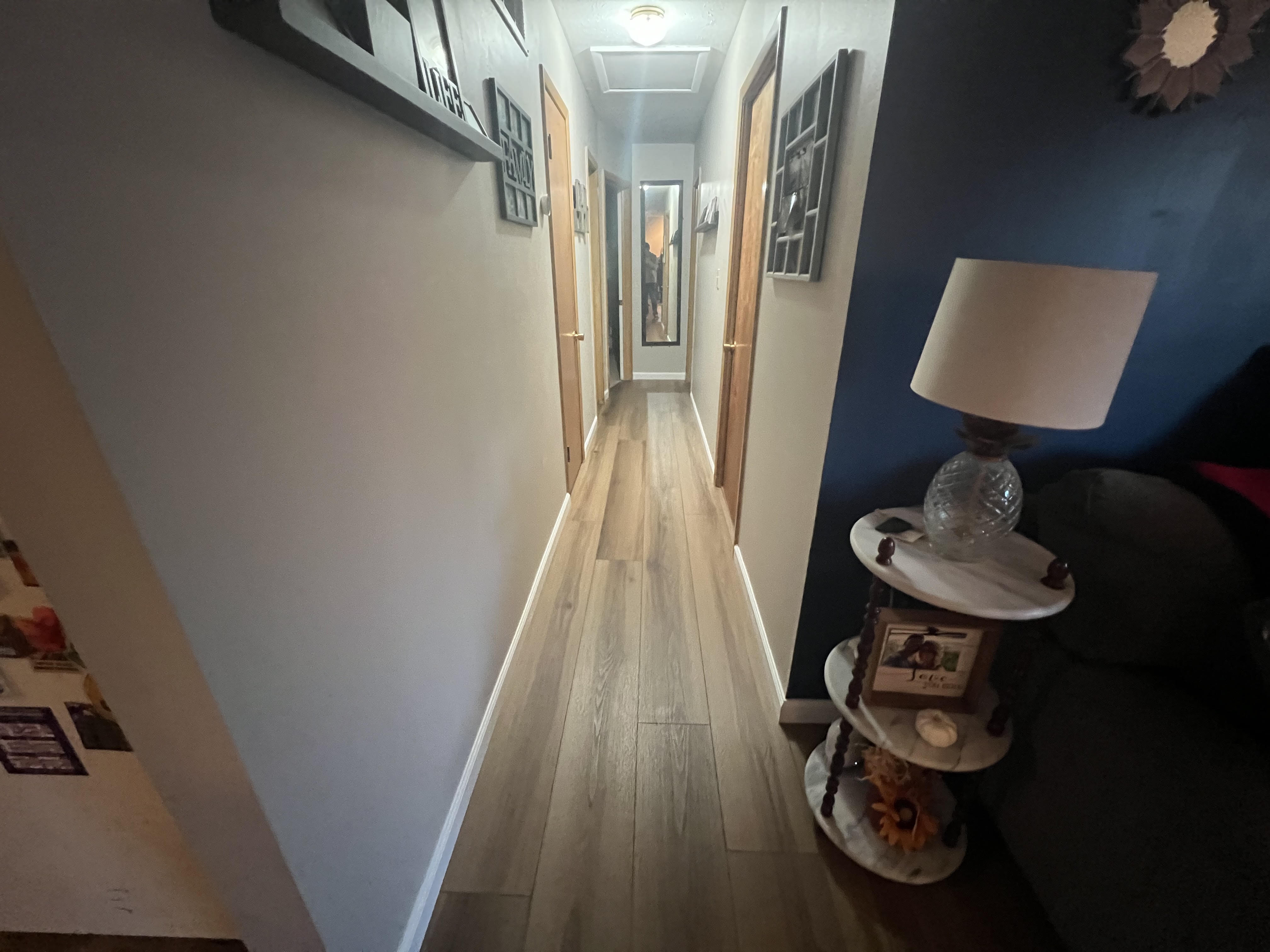 Natural-oak luxury vinyl plank running down a Strongsville hallway